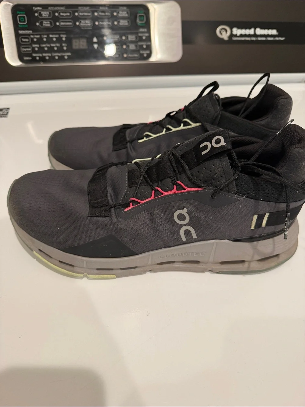 On Running woman’s Black Athletic Shoes with Lime and Pink Accents